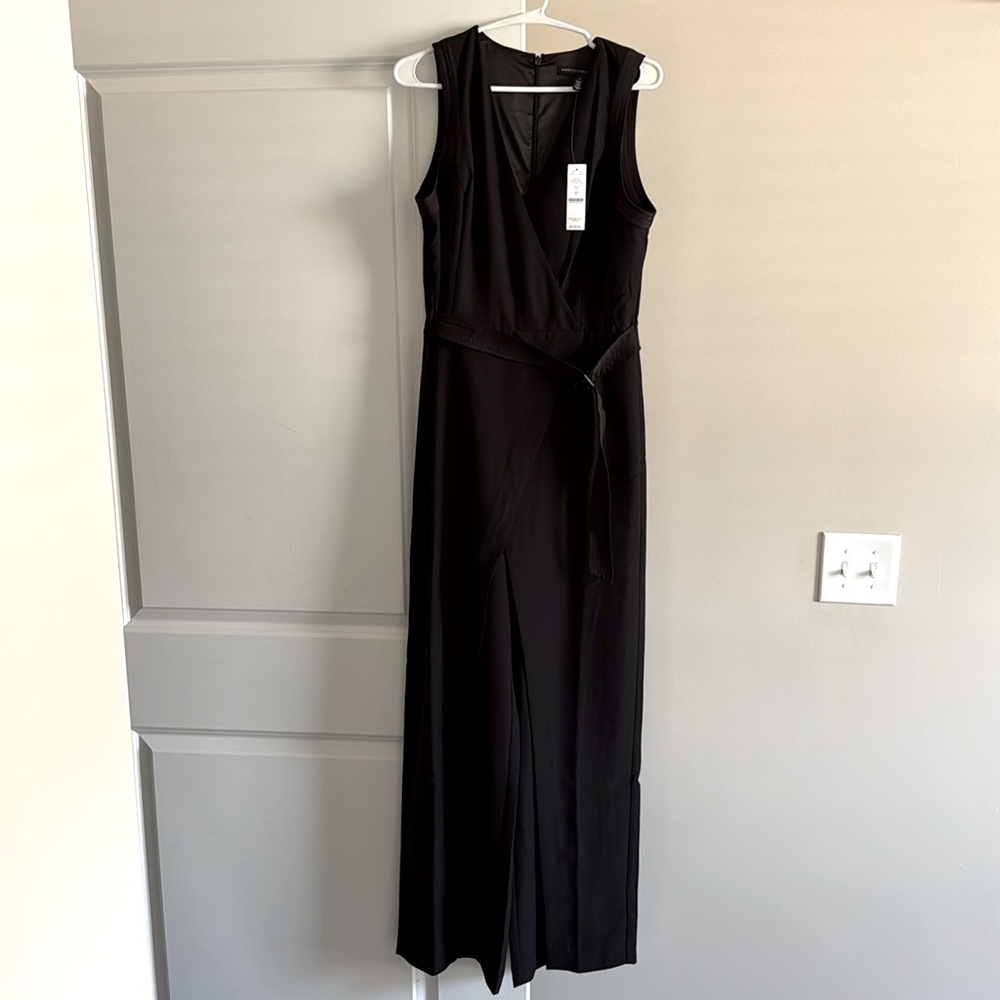 Black formal jumpsuit - size 6
brand: WhiteHouseBlackMarket. BRAND NEW